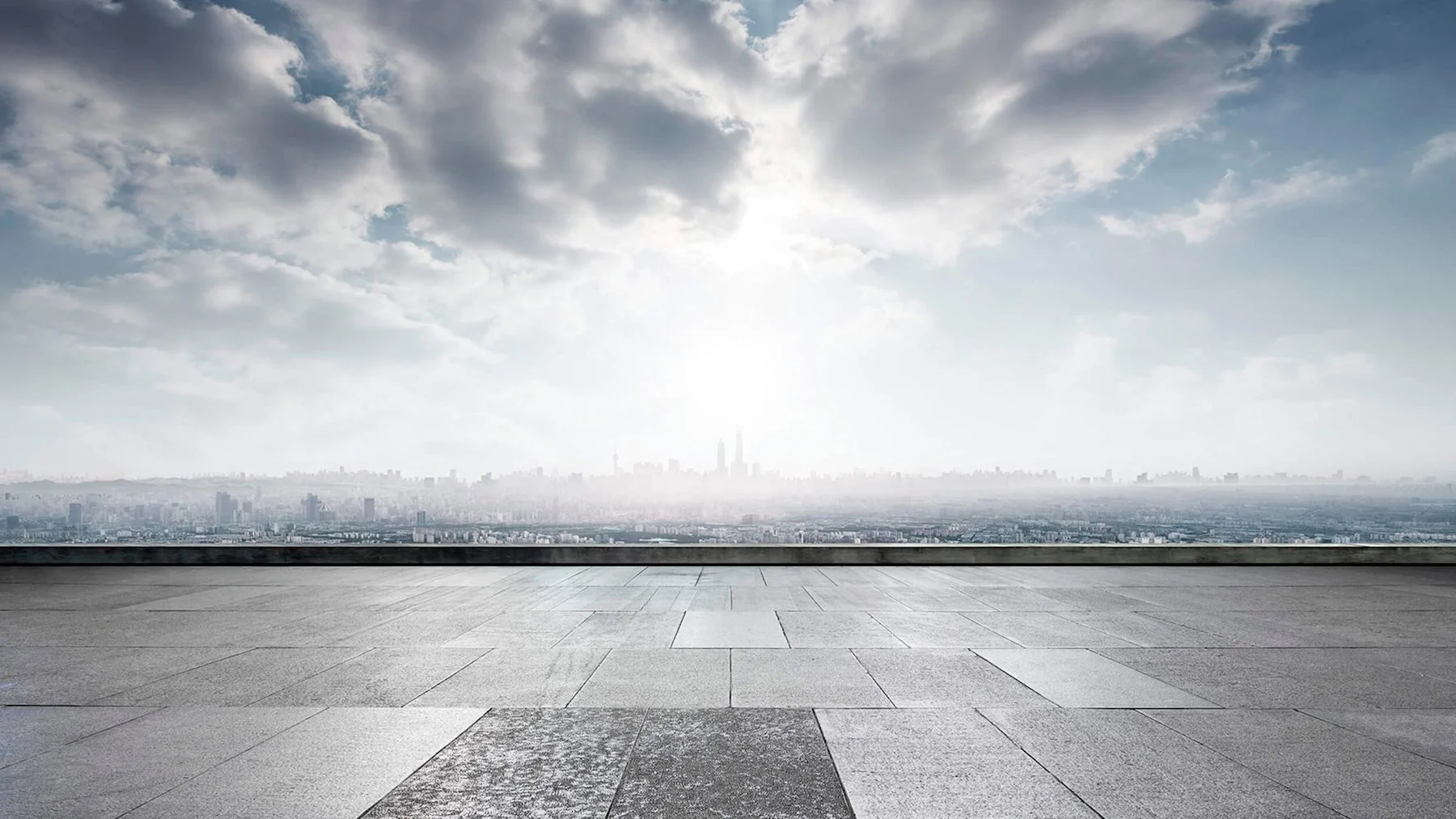 Blick von einer Dachterrasse über die Skyline einer Metropole – Key-Visual der Fundament-Website von 2019