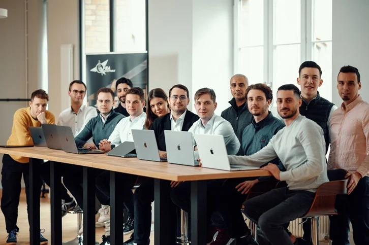 The development team behind Sellerpoint at a shared work table